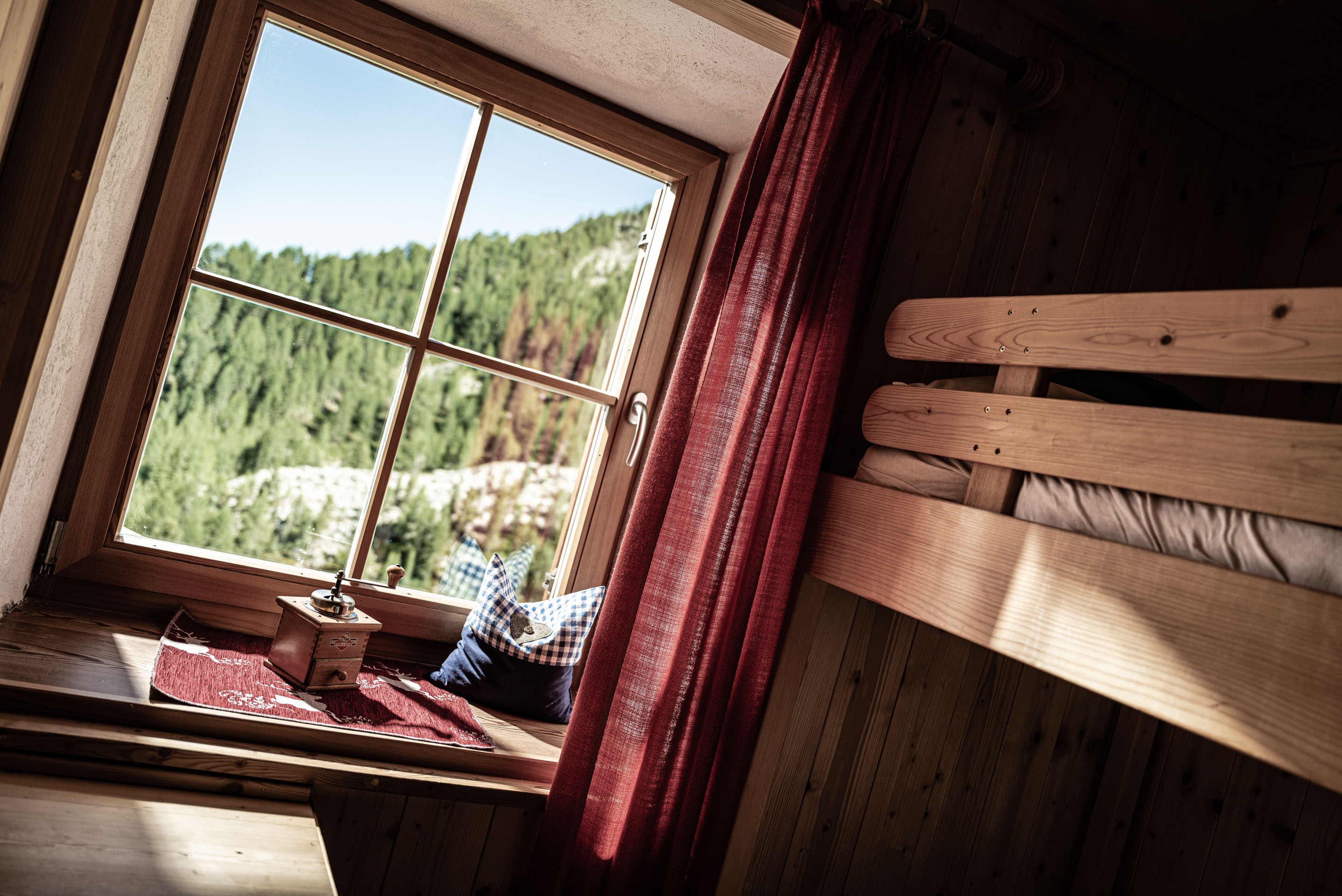 Wooden curtain opens to blue sky